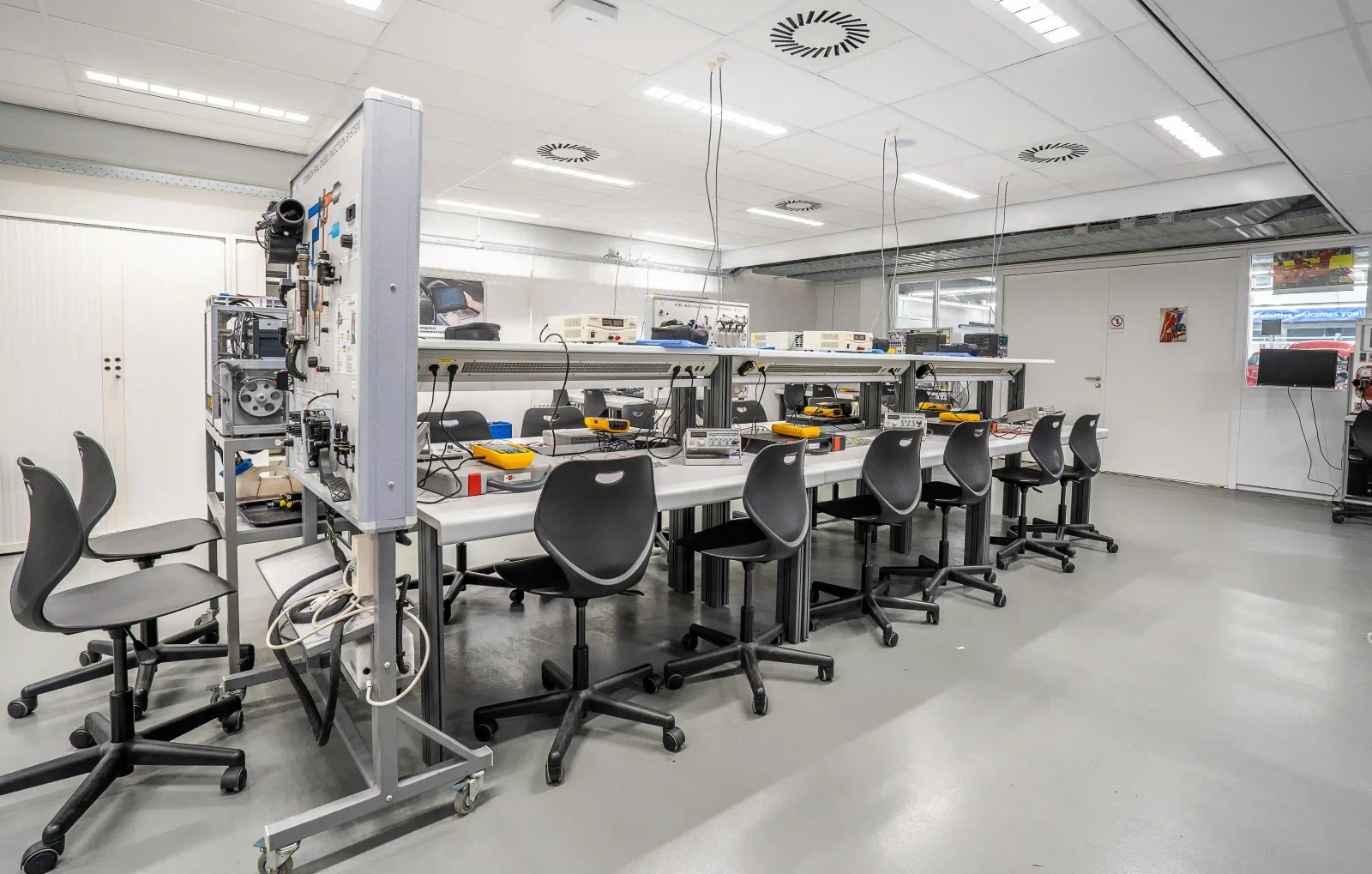 Modern precision measurement devices: atomic clock, electron microscope, laser interferometer, showing the evolution of measurement technology